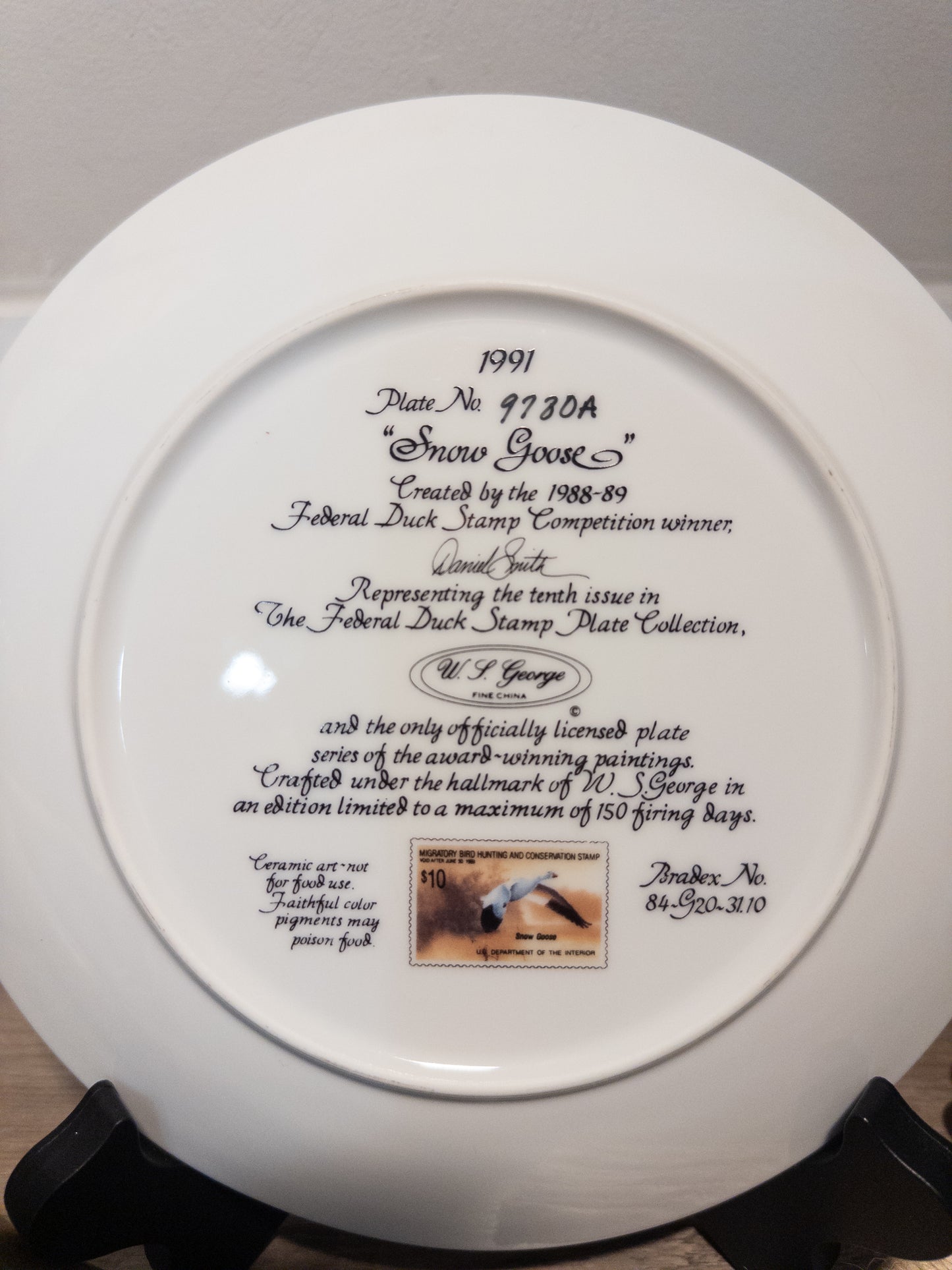 Snow Goose Federal Duck Stamp plate from 1991 by Daniel Smith and W.S. George, featuring detailed artwork of a snow goose.