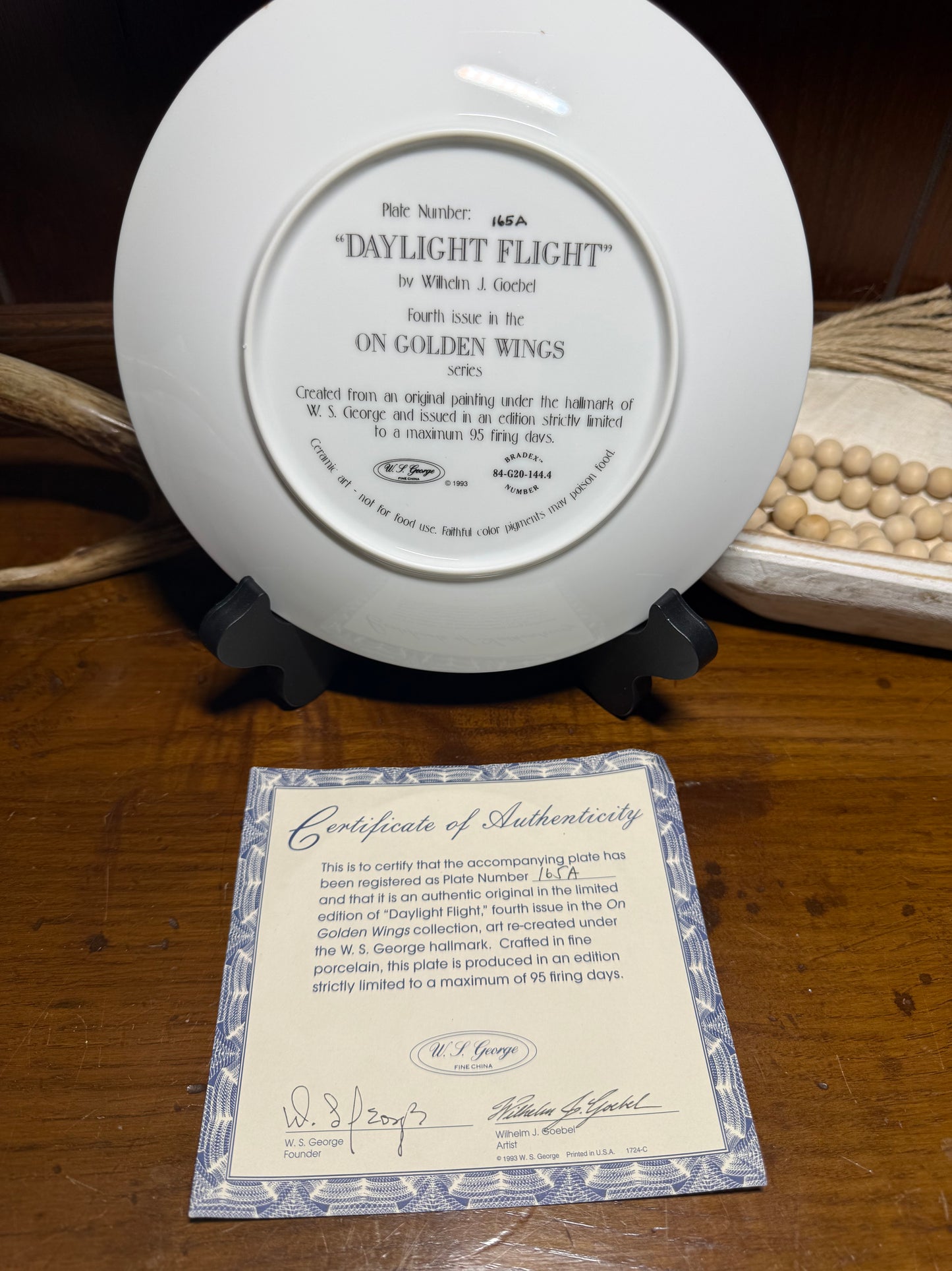 Daylight Flight Snow Goose collector plate by Wilhelm J. Goebel with On Golden Wings design, featuring a snow goose in flight.