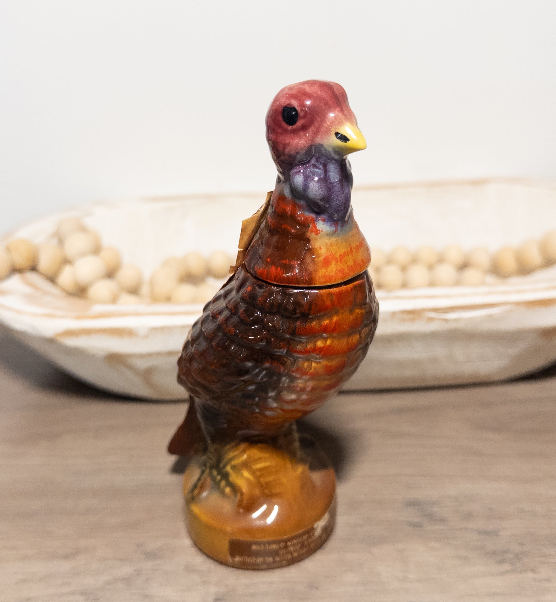 Vintage Wild Turkey ceramic decanter featuring 101 proof bourbon from the 1970s, with Wild Feathered Finds branding.