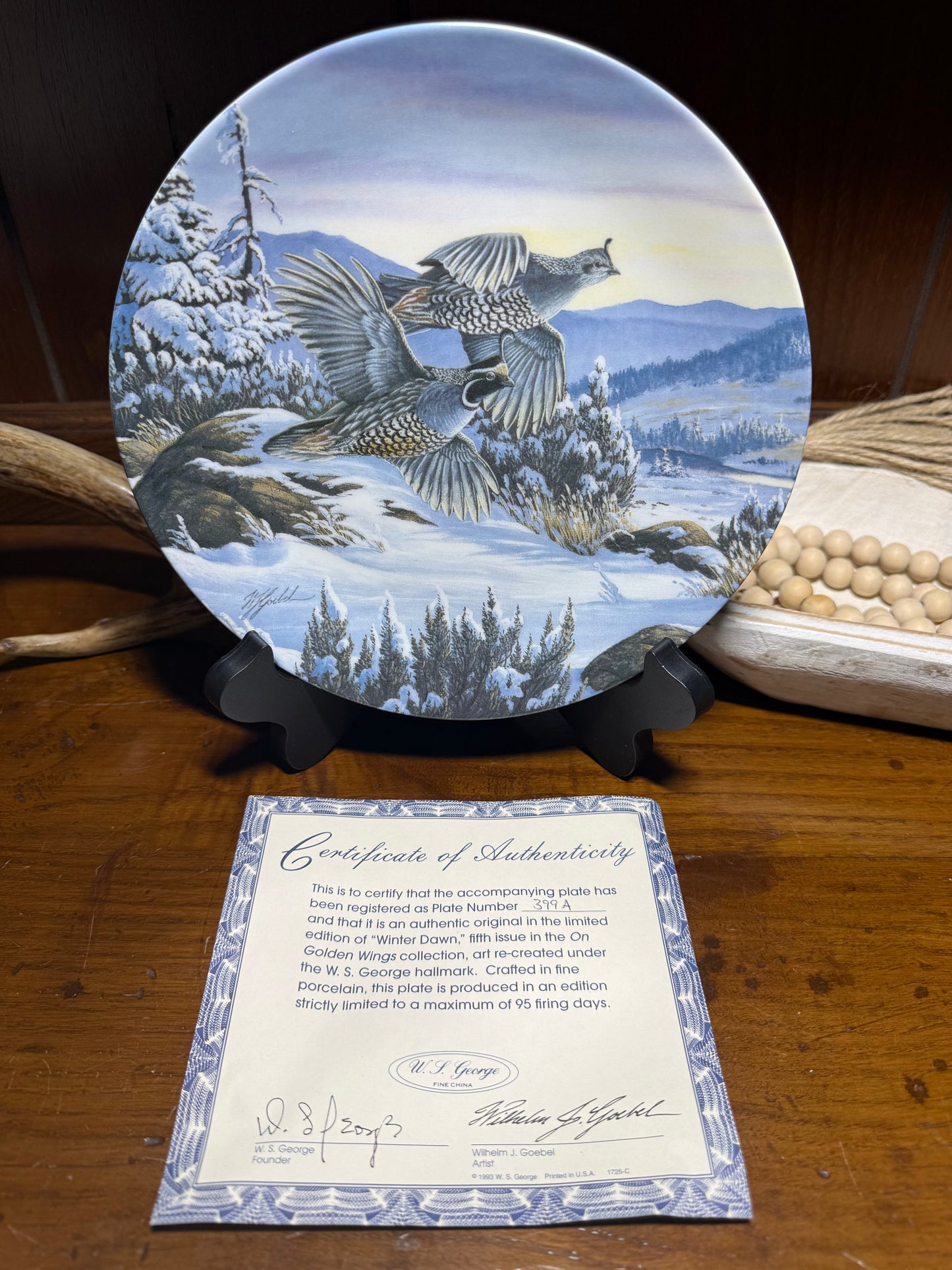 "Winter Dawn plate #399A by Wilhelm J. Goebel, featuring a winter scene with golden wings, displayed with COA, from Wild Feathered Finds."