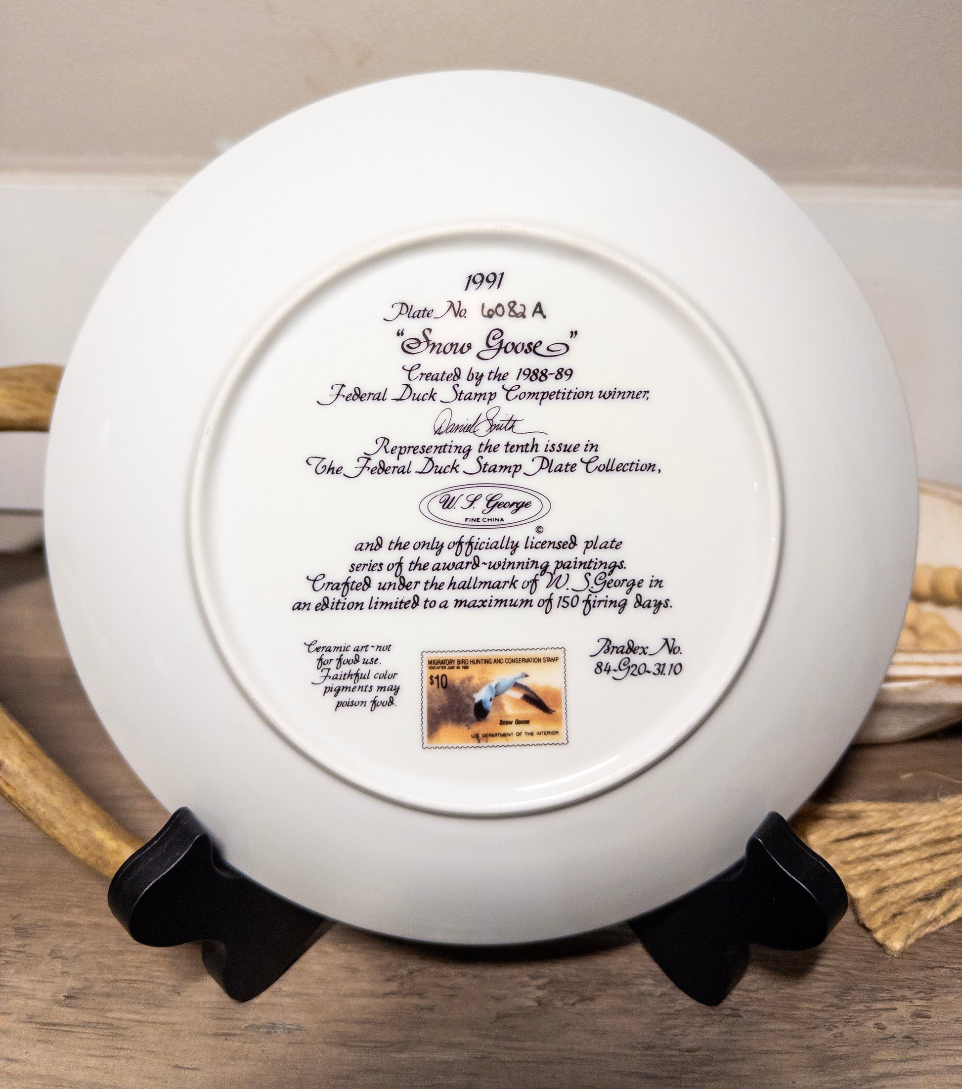 Snow Goose Federal Duck Stamp Plate 1991 by Daniel Smith with Certificate of Authenticity, featuring detailed artwork of a snow goose.