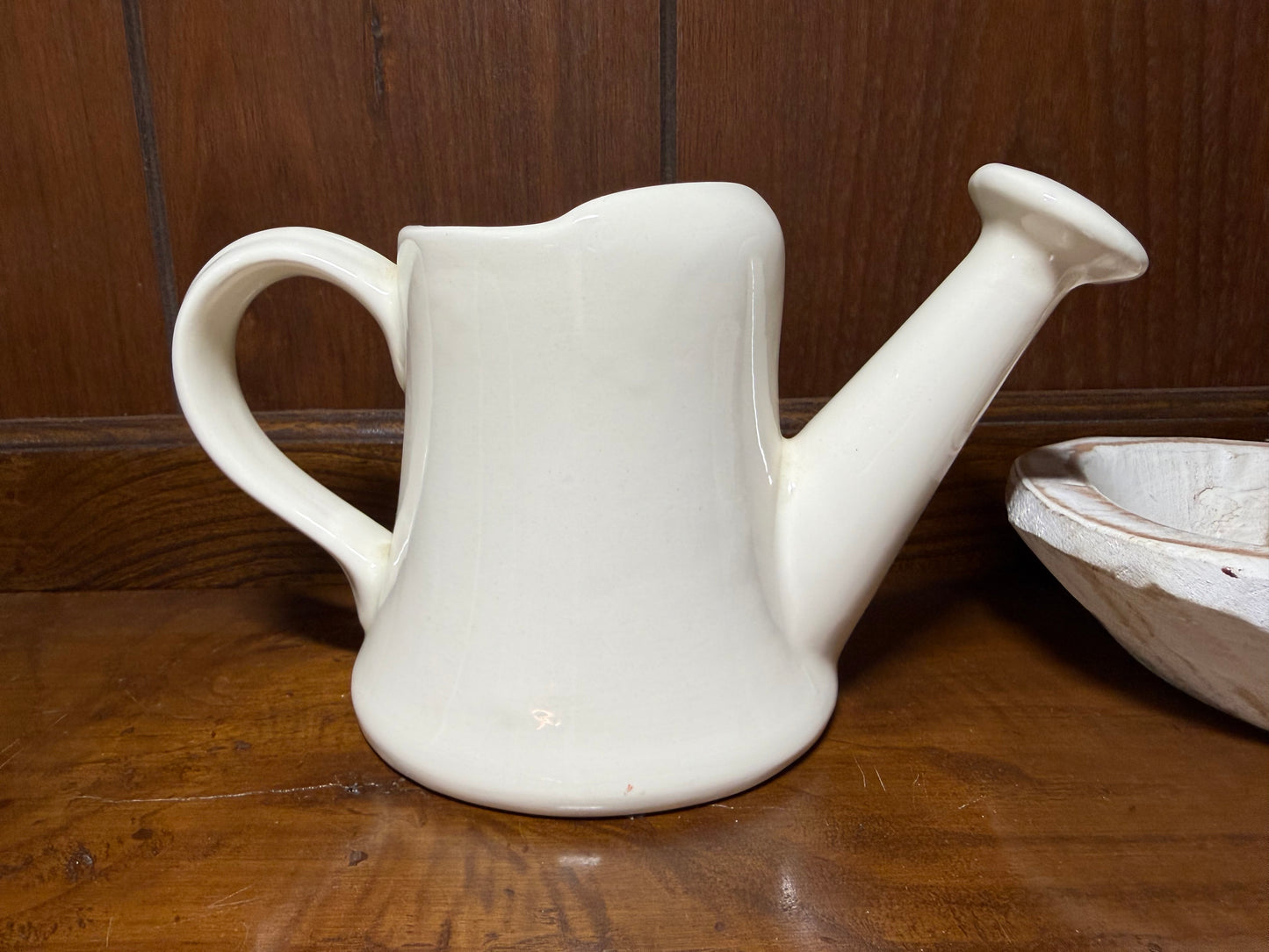 Vintage ceramic watering can planter with floral cottage style design in cream glazed pottery by Wild Feathered Finds.
