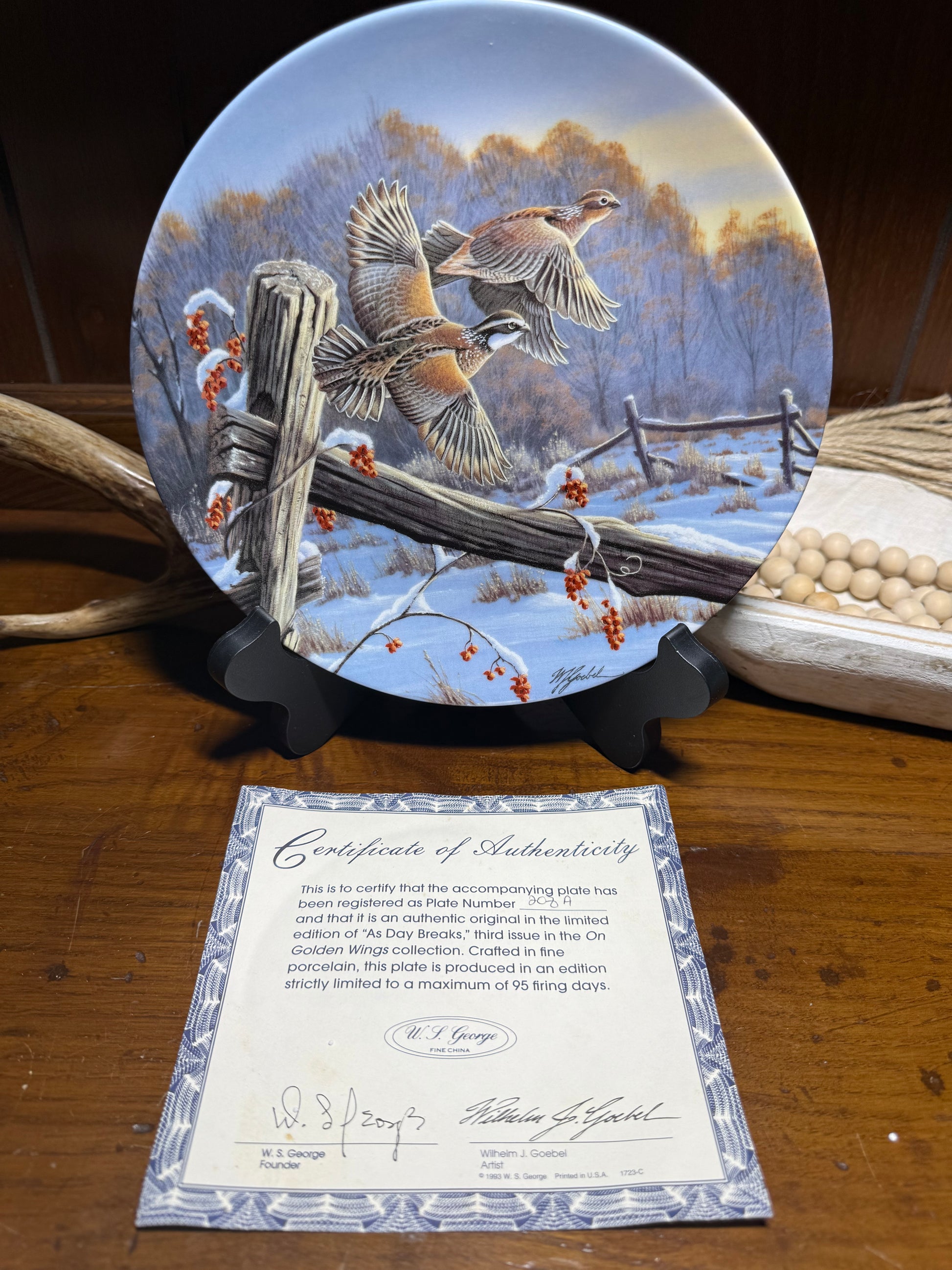 Wildlife collector plate titled “As Day Breaks” by Wilhelm J. Goebel, featuring golden winged birds, with COA from Wild Feathered Finds.
