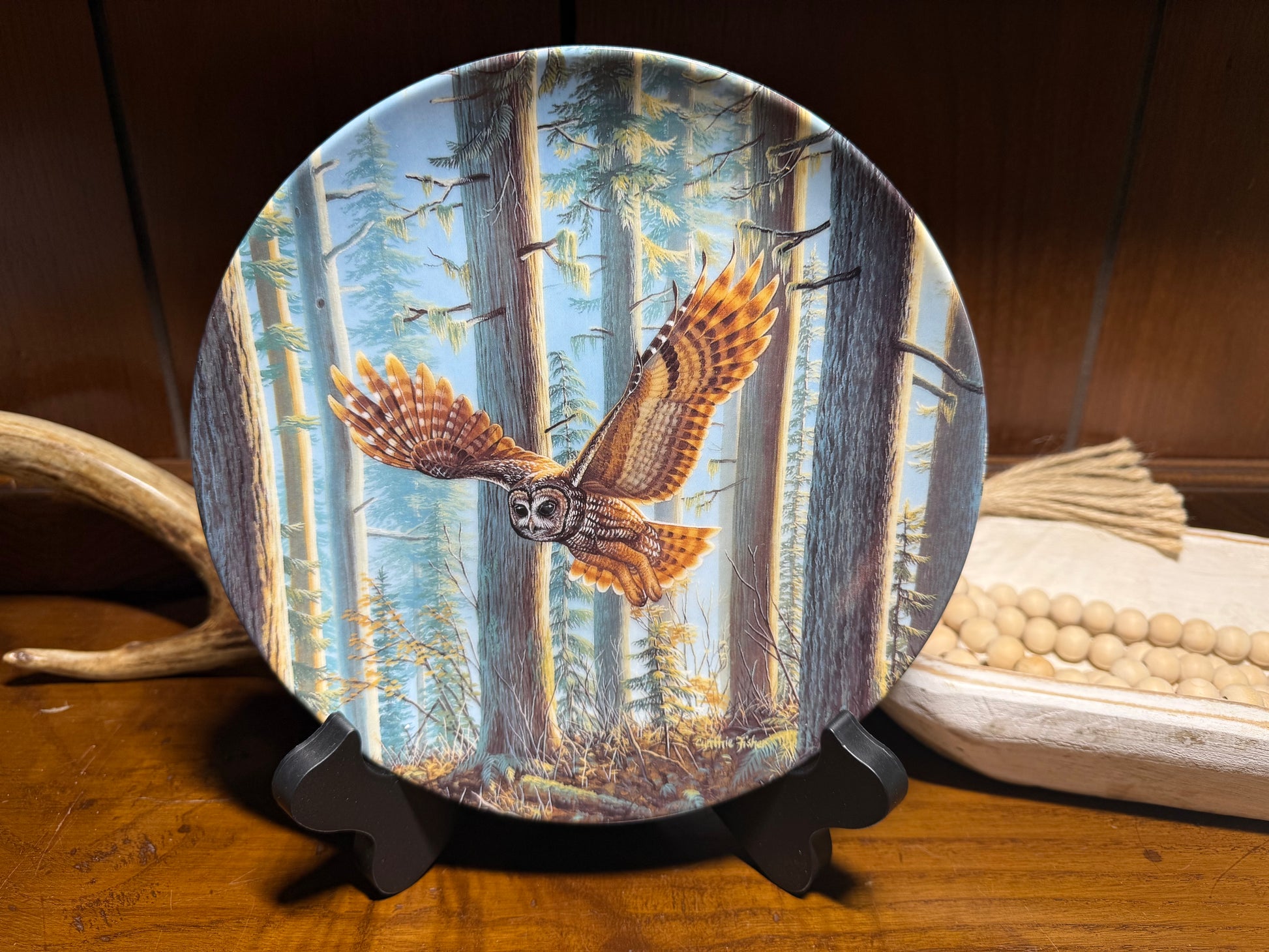 Wild Feathered Finds “Sunset Splendor” owl plate by Cynthia Fisher, featuring a vibrant sunset owl design with detailed craftsmanship.