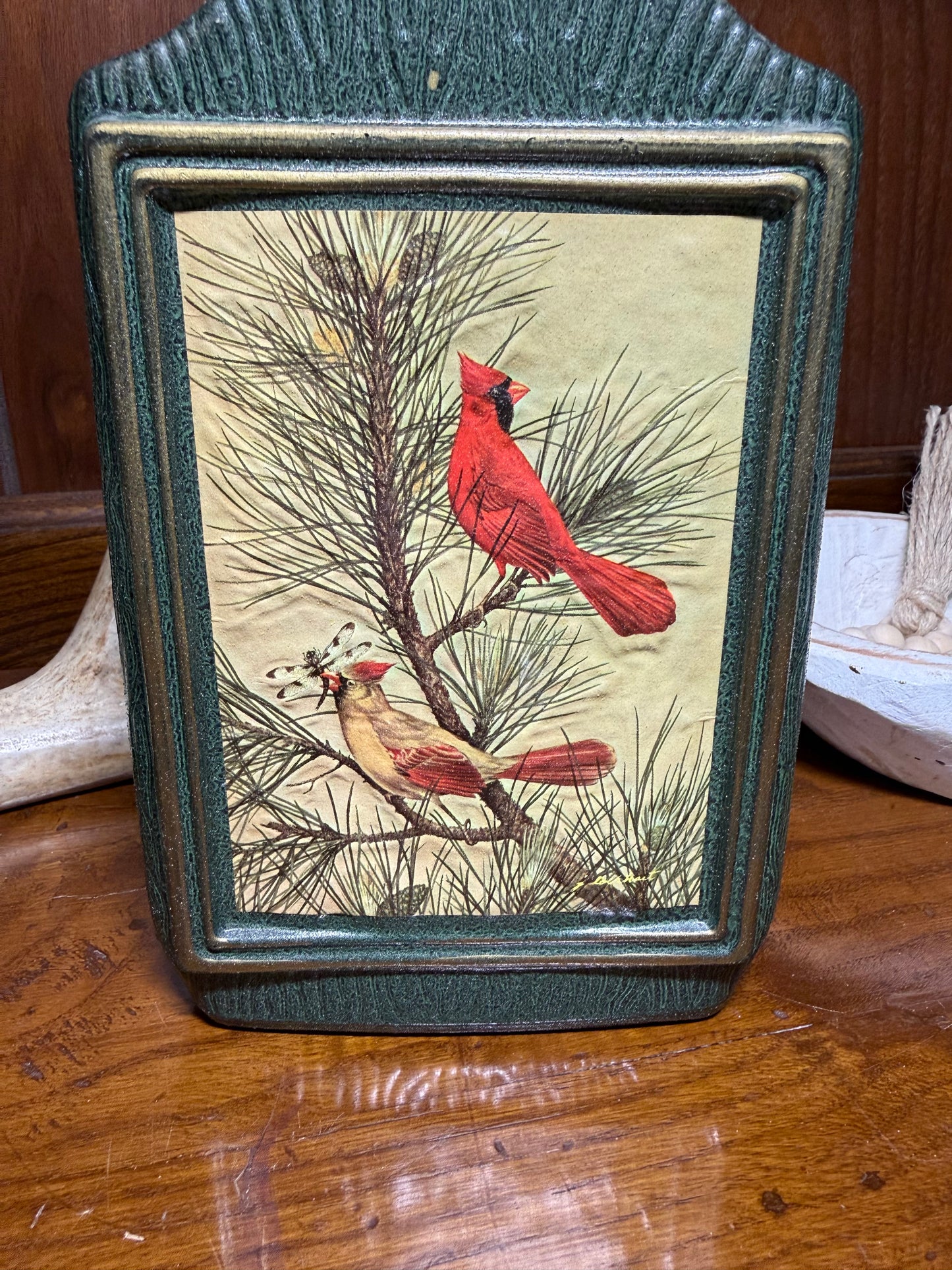 Vintage Jim Beam Bird Decanter featuring James Lockhart cardinal artwork, displayed with detailed bird and decanter design.
