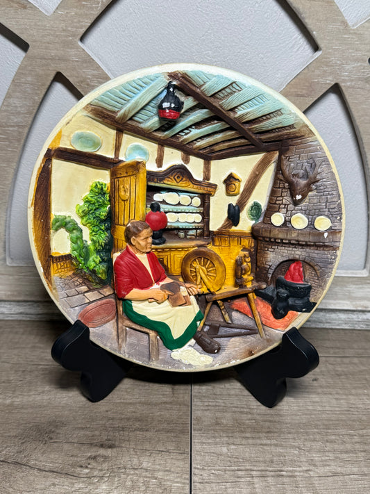 Vintage Italian wall plaque by Wild Feathered Finds featuring a raised relief cottage interior folk art scene for rustic decor.