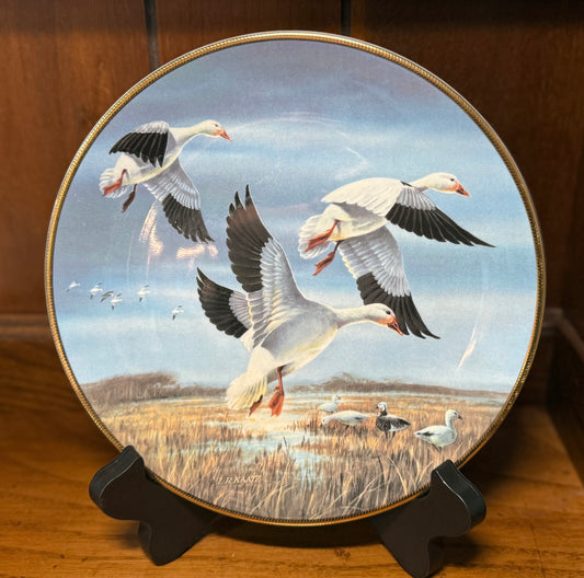 Ducks Unlimited Snow Geese against November skies plate by Lynn Kaatz, 1990, from Wild Feathered Finds collection.