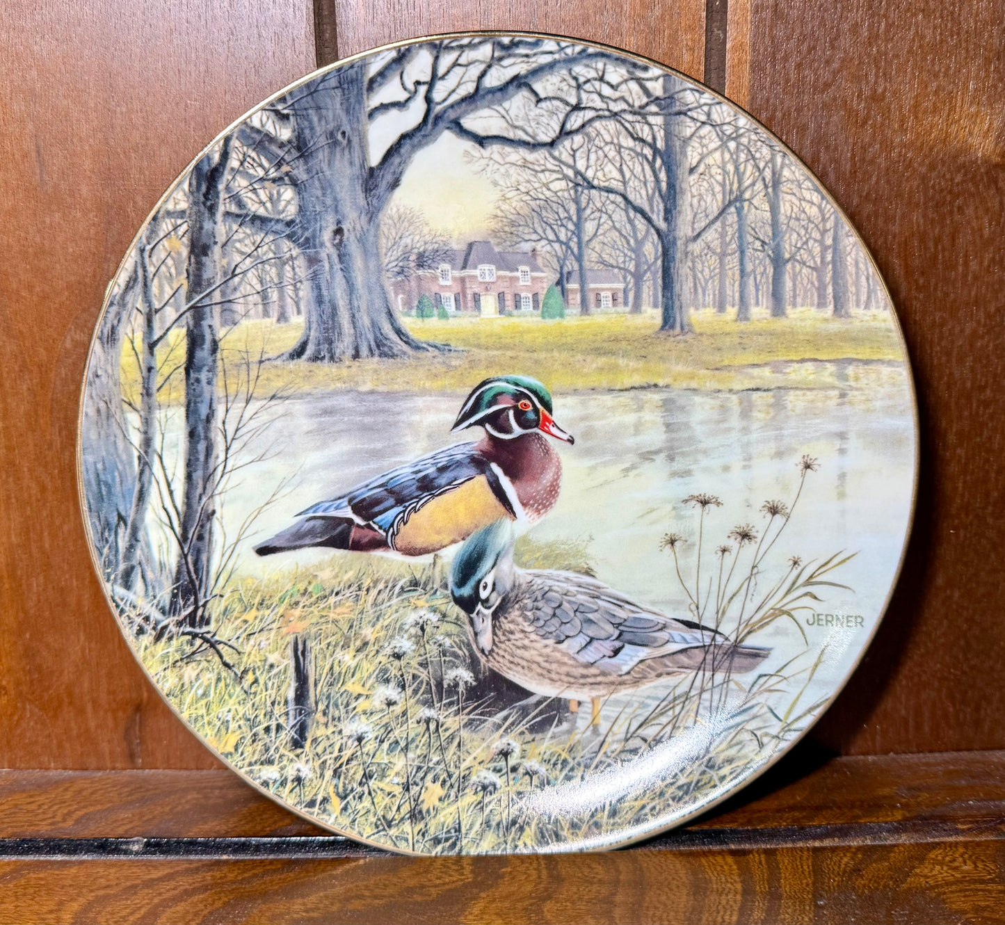 Vintage 1987 Knowles "The Wood Duck" collector plate by Wild Feathered Finds, featuring detailed artwork of a wood duck in flight.