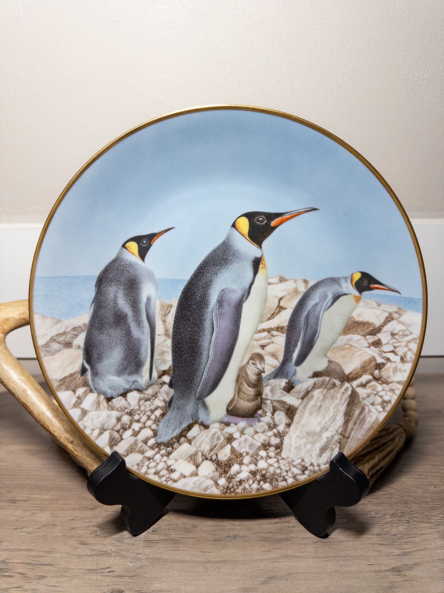 Limited edition porcelain plate featuring an emperor penguin, part of the Danbury Mint 12 Waterbird Plates collection by Wild Feathered Finds.