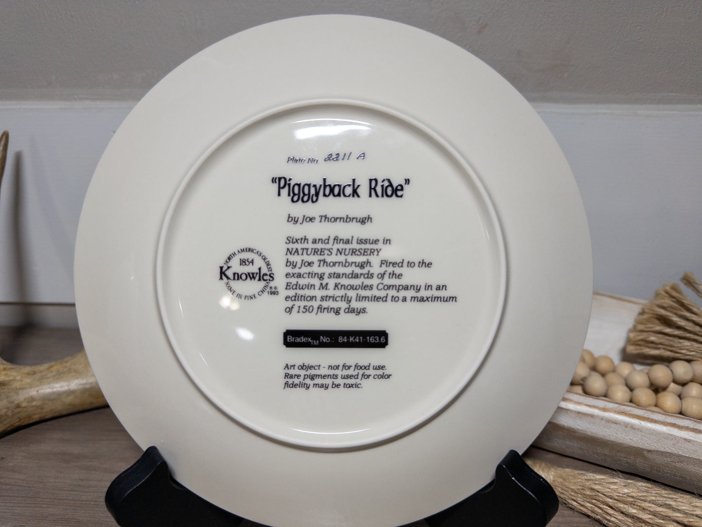 Vintage Canvasback Duck collector plate "Piggyback Ride" by Joe Thornbrugh, featuring a nature scene with ducks from Wild Feathered Finds.
