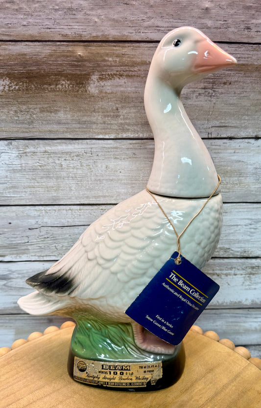 Vintage Jim Beam Snow Goose ceramic decanter from The Beam Collection First in Series, featuring detailed snow goose design.