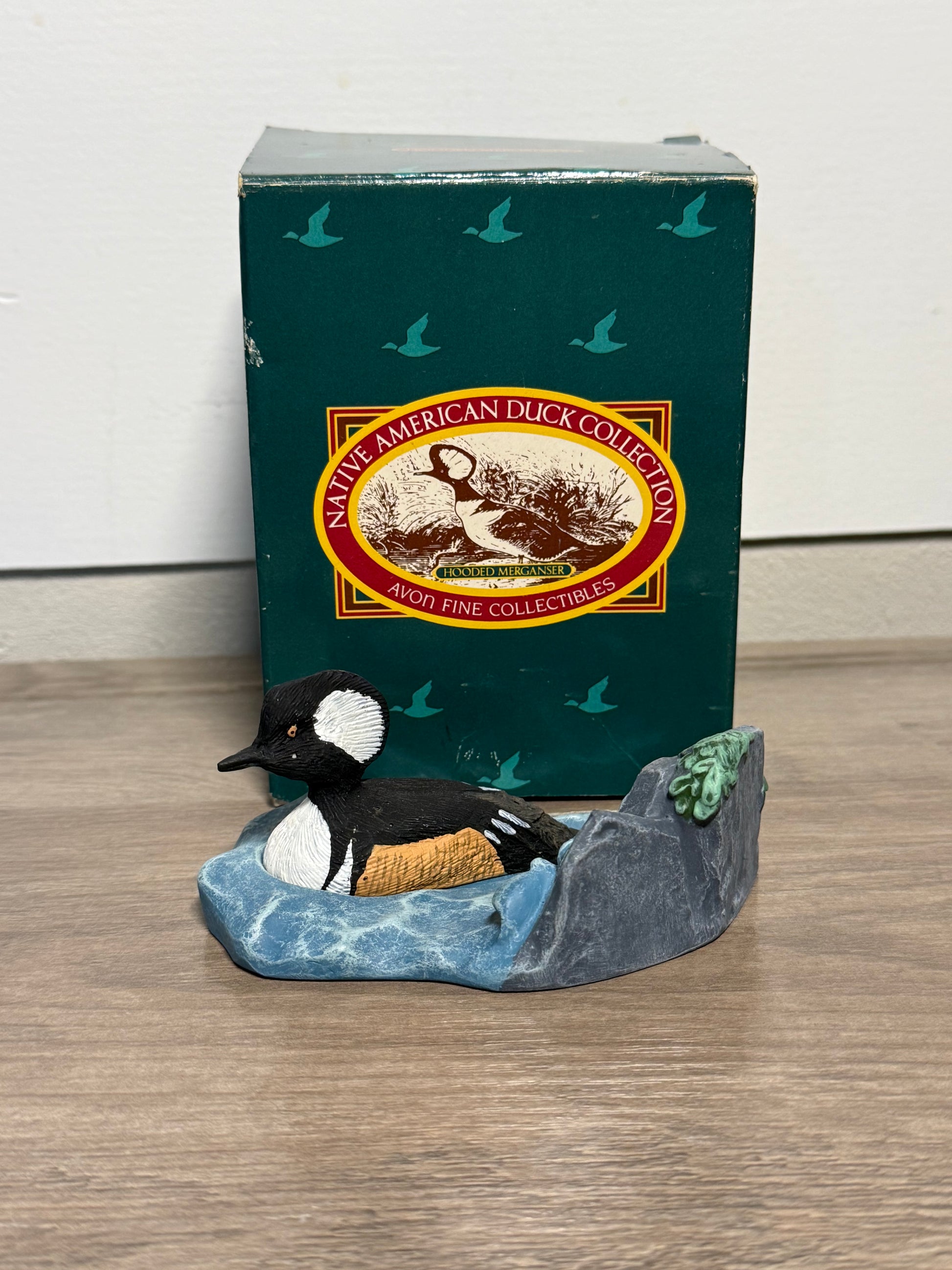 Vintage Avon hooded Merganser duck figurine from Wild Feathered Finds, part of the Native American collection with box, 1989.