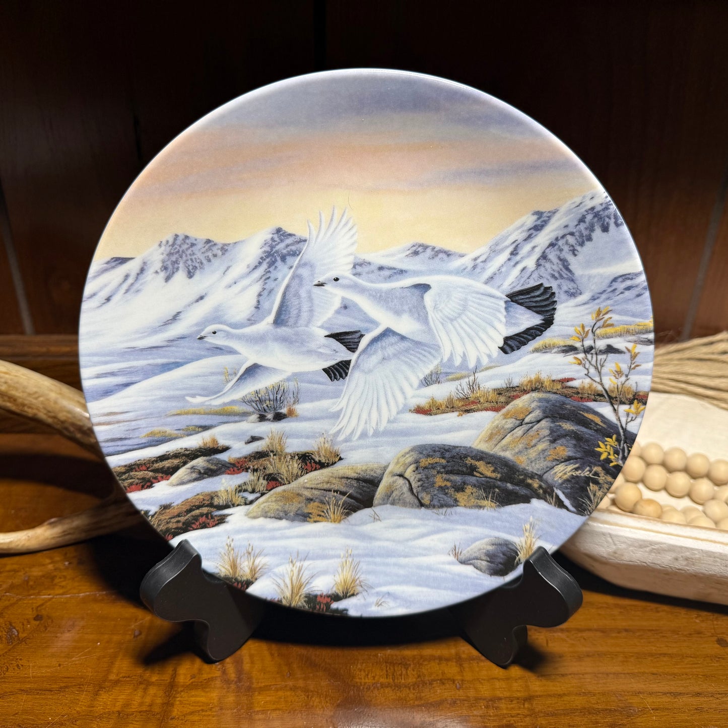 Daylight Flight Snow Goose collector plate by Wilhelm J. Goebel, featuring a golden wing design and collector's certificate.