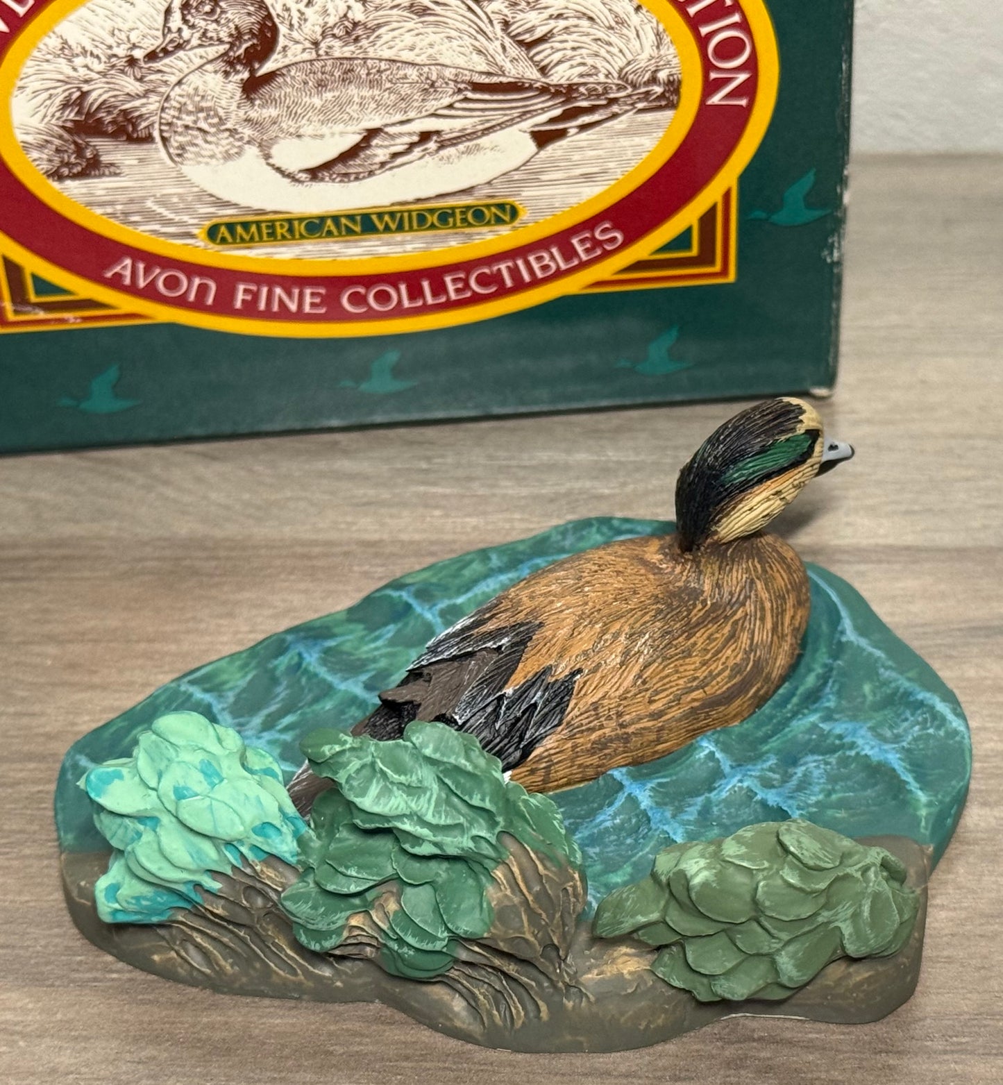 Vintage Avon American Widgeon duck figurine from Wild Feathered Finds collection, displayed with its original box.