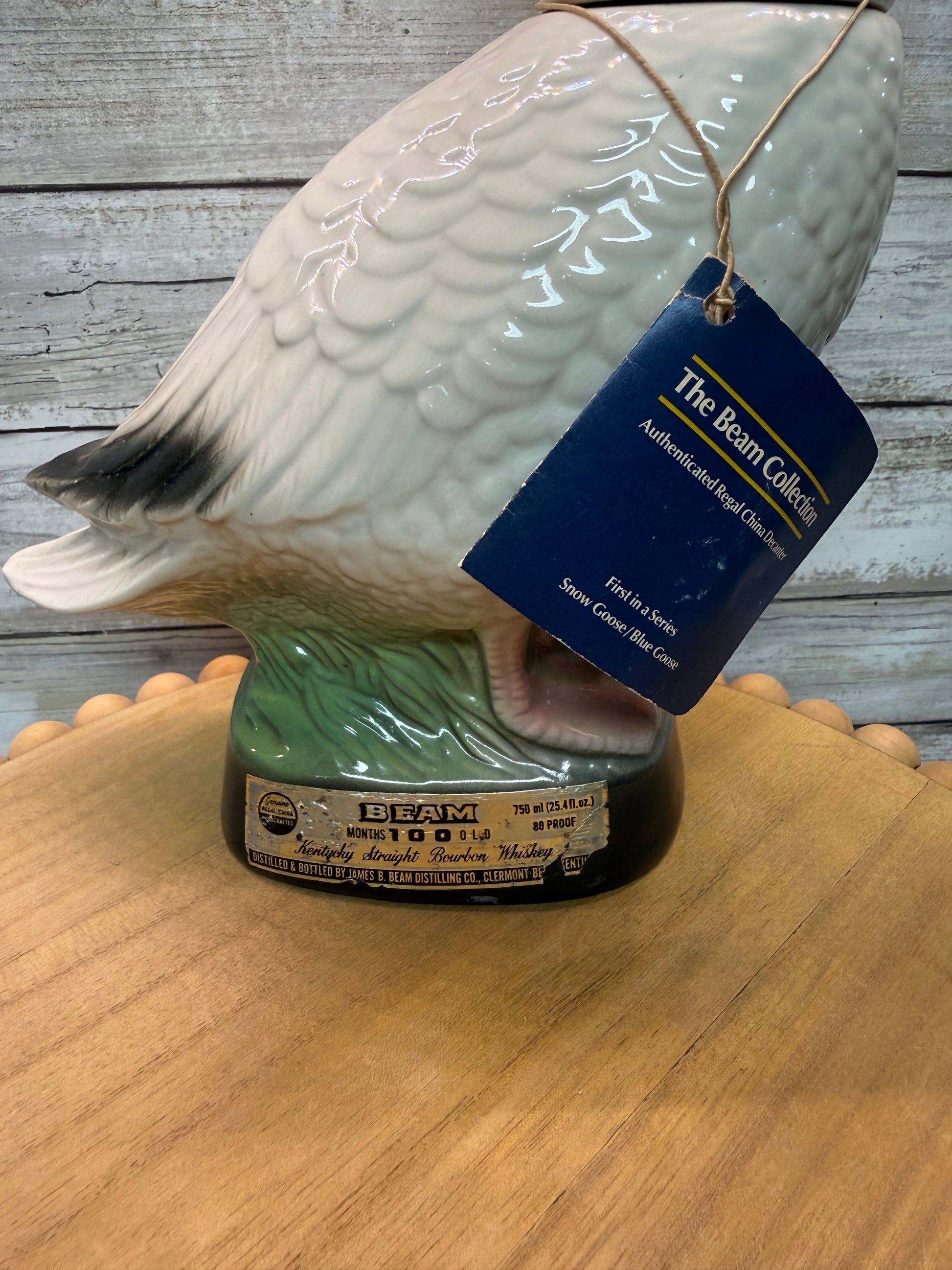 Vintage Jim Beam Snow Goose ceramic decanter from The Beam Collection First in Series, featuring detailed snow goose design.