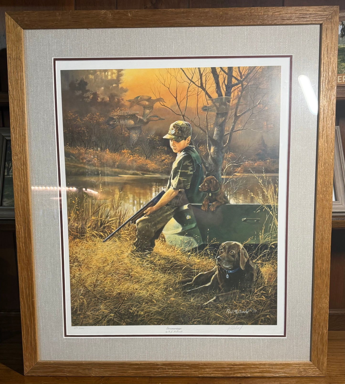 Ducks Unlimited Greenwings signed limited edition framed print by R.J. McDonald, featuring vibrant duck artwork in a 27x32 inch frame.