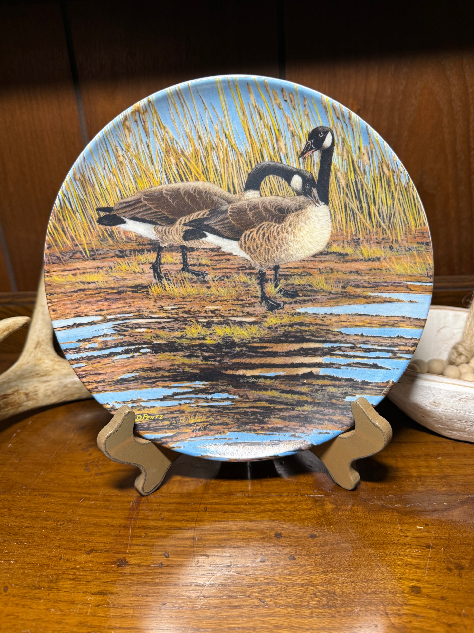 Vintage Canada Goose Plate “Courtship” by Donald Pentz, part of Wings Upon the Wind series, featuring detailed bird artwork from 1986.