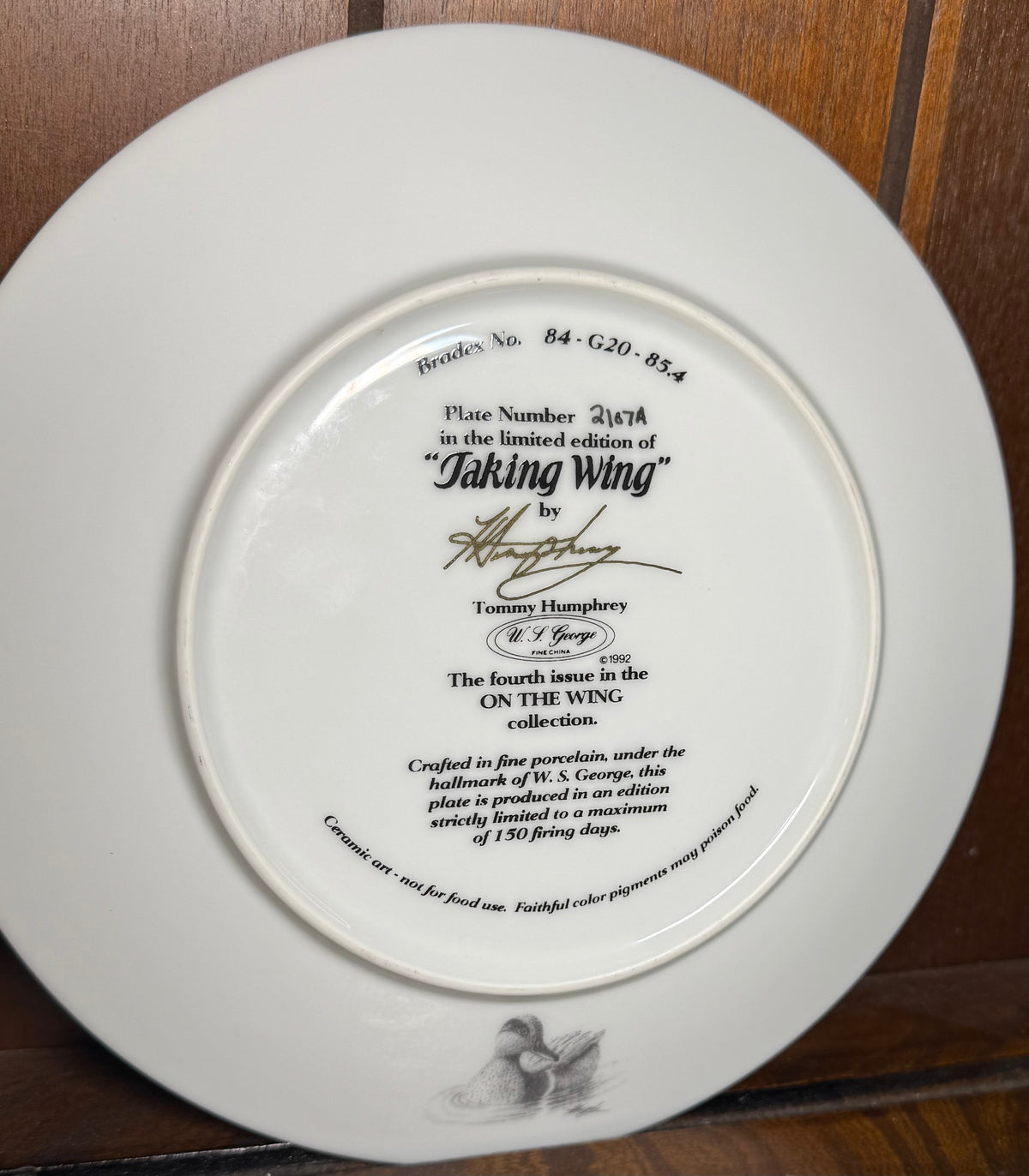 Vintage 1992 W.S. George Taking Wing Duck collector plate by Tommy Humphrey, featuring detailed artwork of a flying duck.