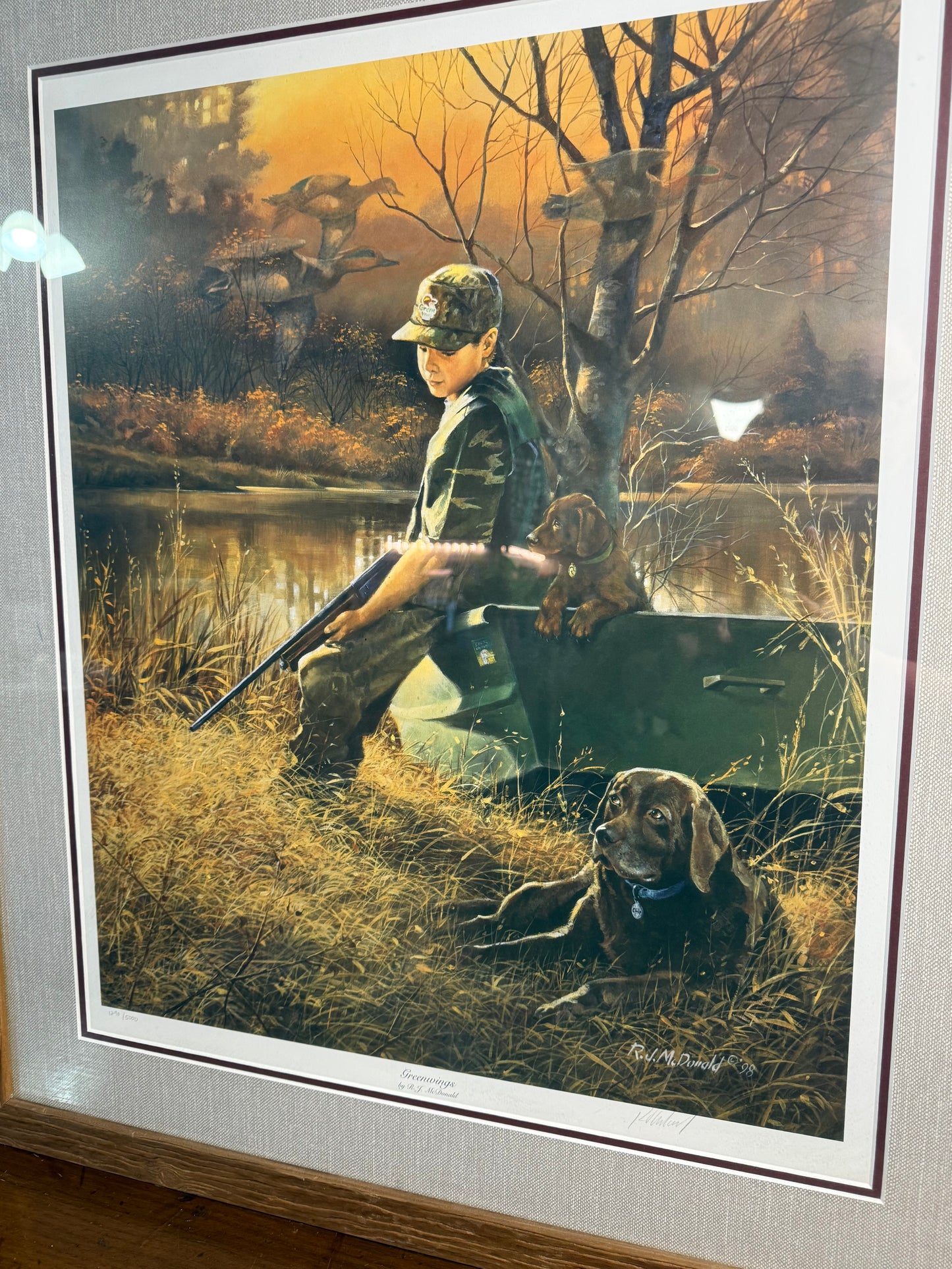 Framed Ducks Unlimited Greenwings limited edition print by R.J. McDonald, featuring ducks in natural habitat, 27x32 inches.