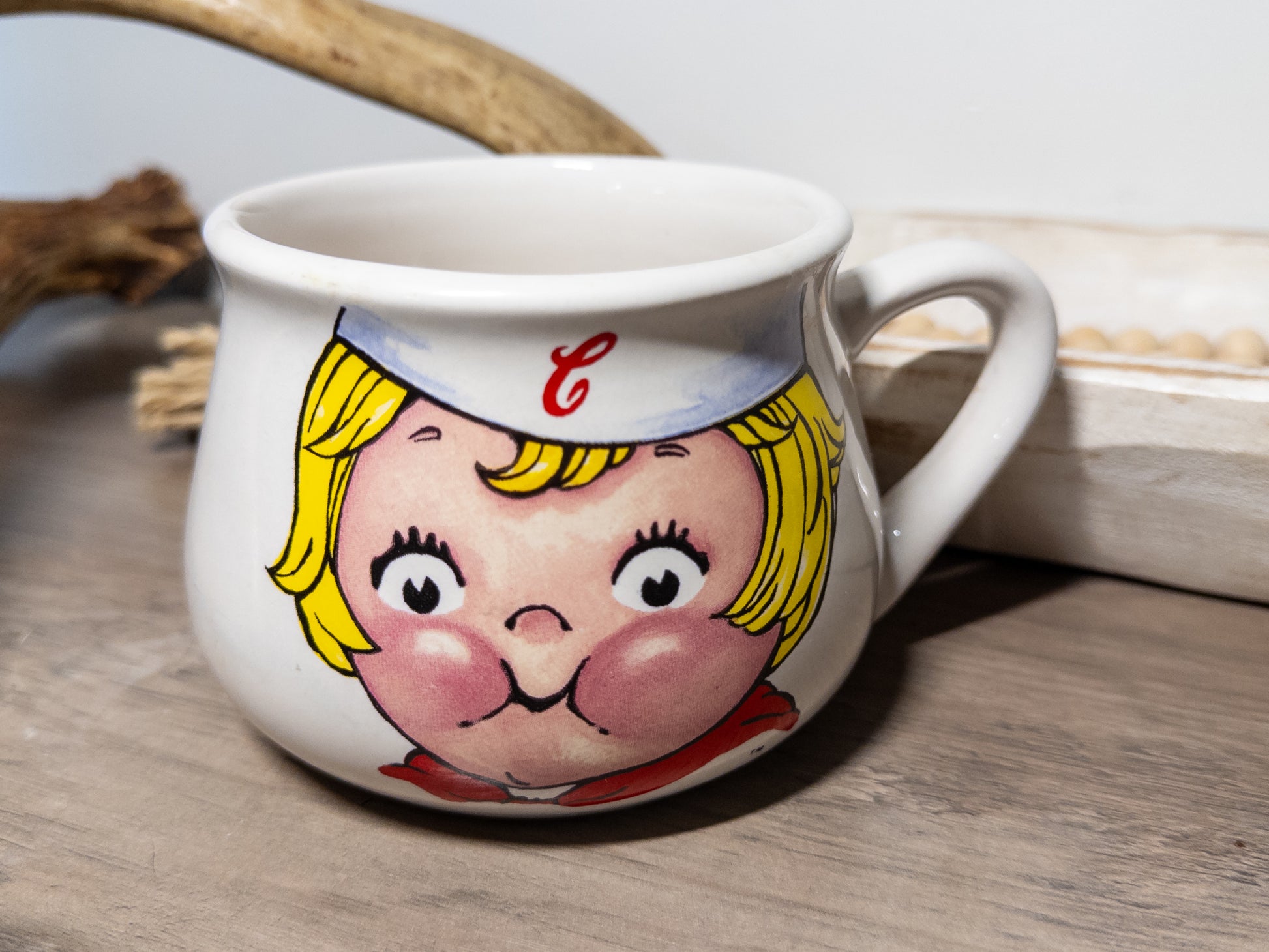 Vintage Campbell Soup Kids mug from 1998 featuring Houston Harvest design, ceramic cup with colorful soup imagery by Wild Feathered Finds.